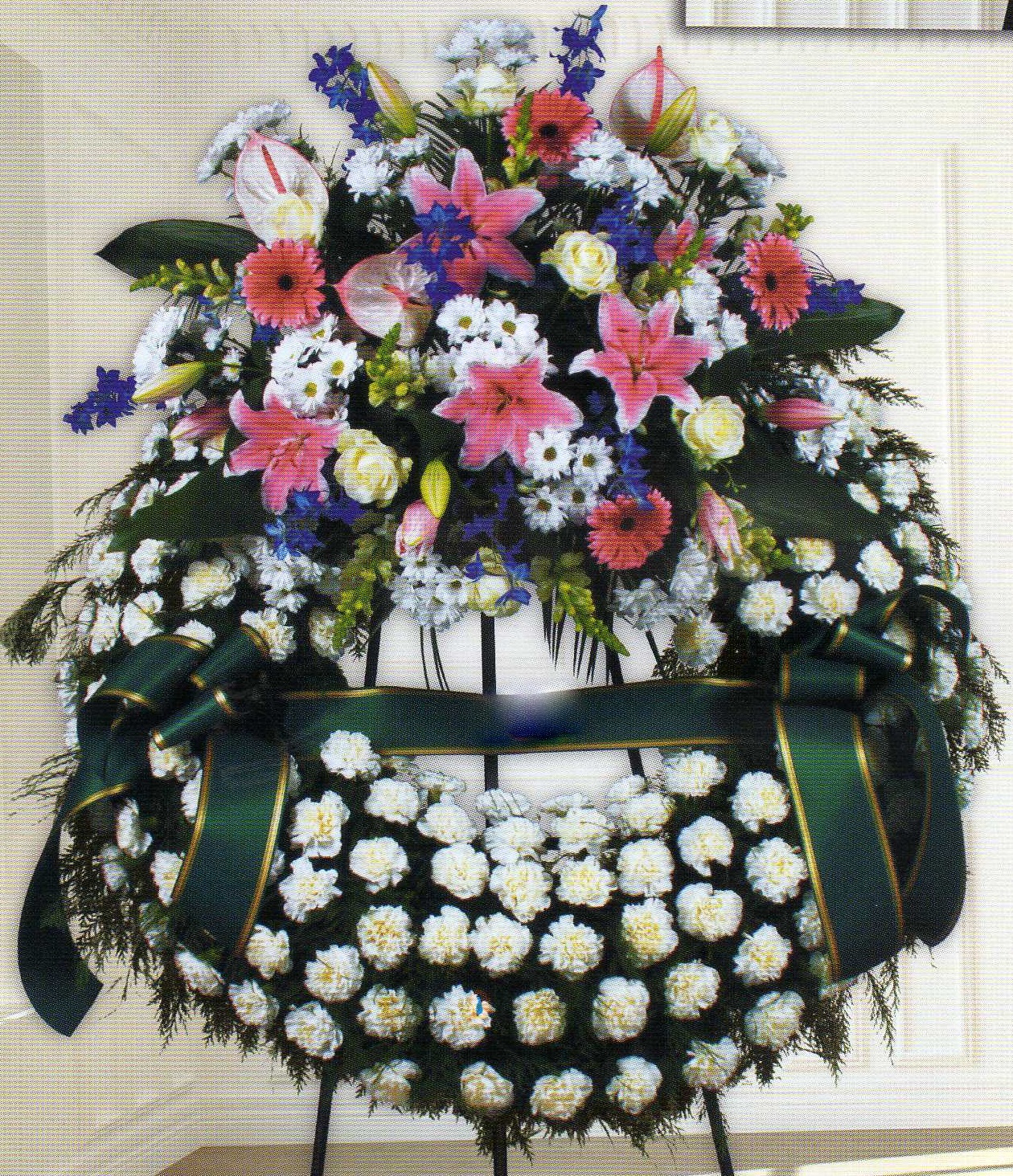CORONA FUNERARIA. Incluye cinta e inscripción.